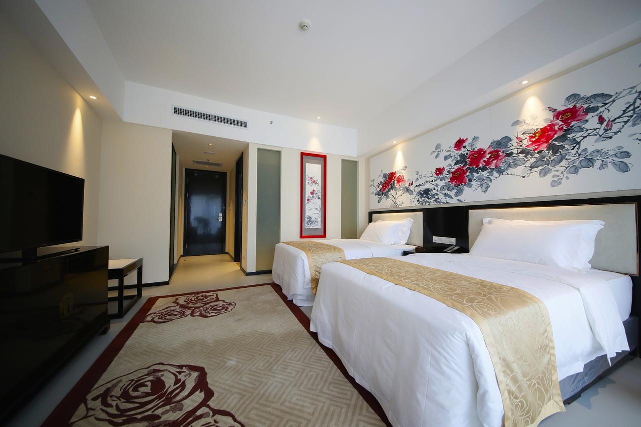 Howard Johnson Flower City Hotel Kunming Bagian luar foto