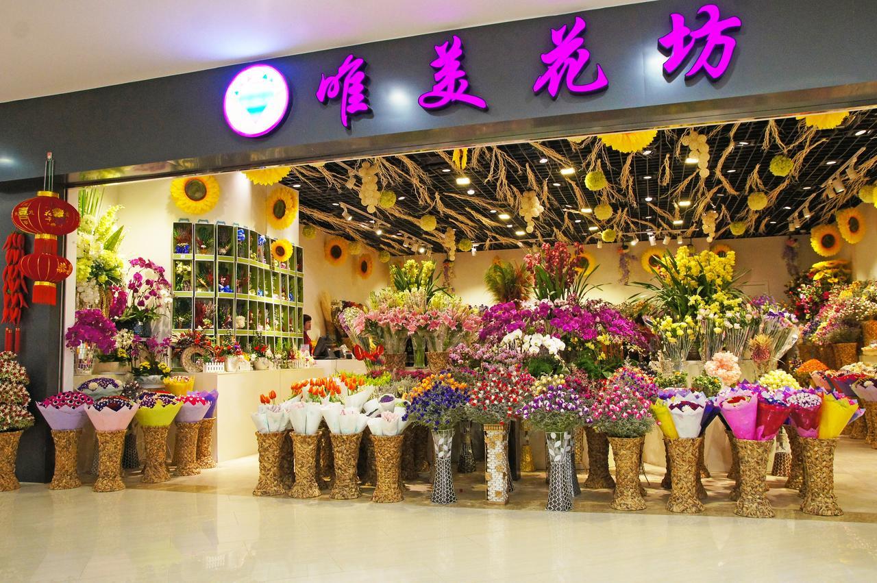 Howard Johnson Flower City Hotel Kunming Bagian luar foto