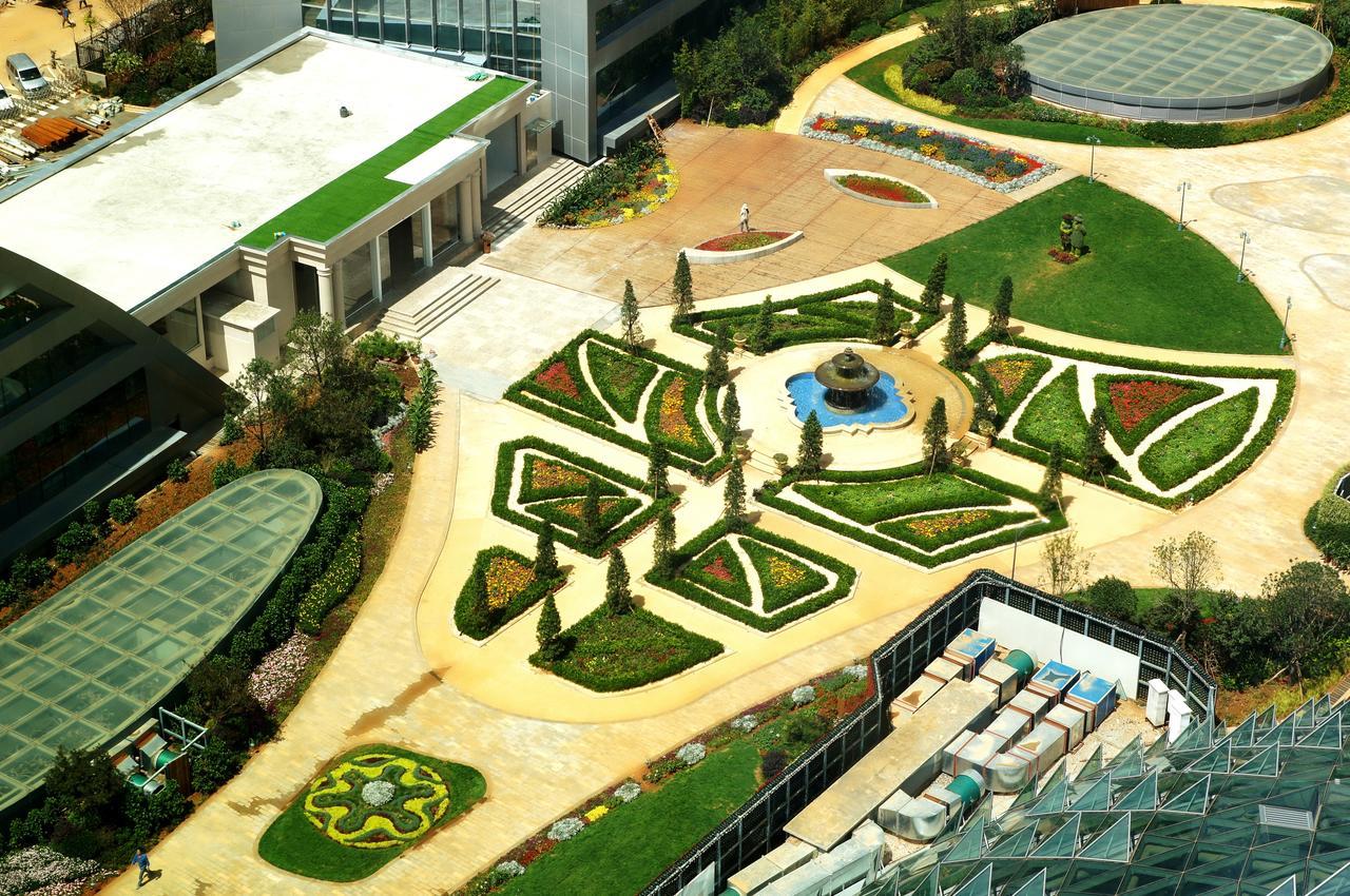 Howard Johnson Flower City Hotel Kunming Bagian luar foto